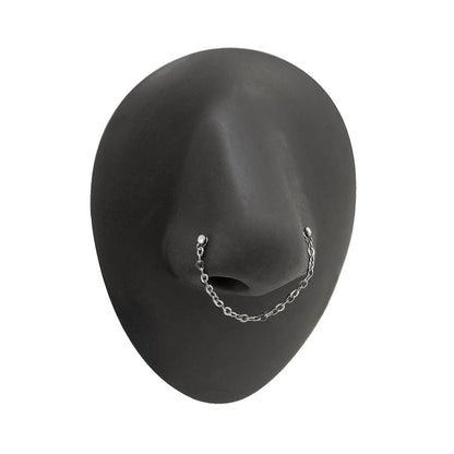 20g 1/4” Crystal Nose Bones with Chain — Bezel Set Jewel on Silicone Nose (Side)